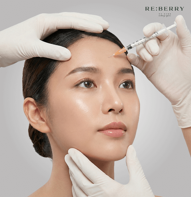 hands of doctors with white gloves injecting botox in a woman forehead