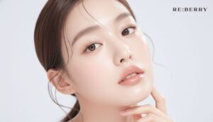 a beautiful woman with fresh skin posing with finger under chin