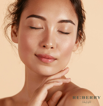 a woman with firm skin and jawline posing with closed eyes