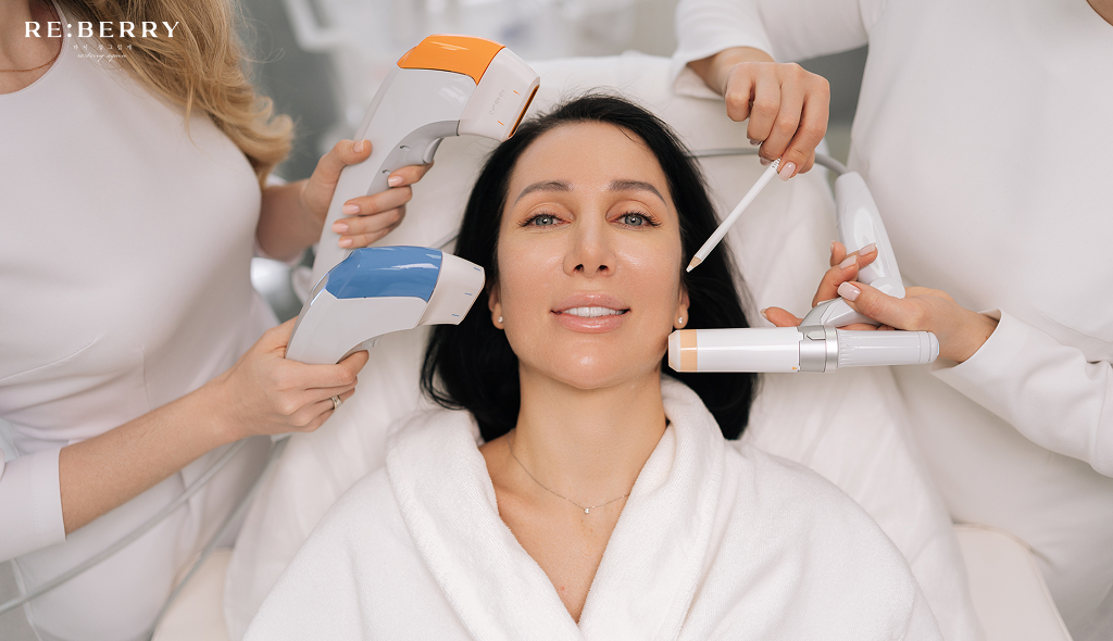 a woman laying on bed and doctors going to perform facial treatment