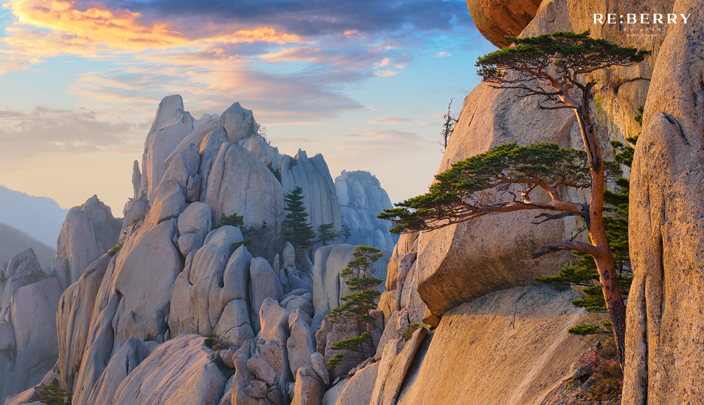 stone mountains at seoraksan national park with few clouds above on the sky
