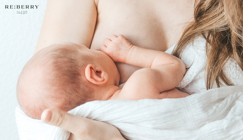 mother breastfeeding her baby