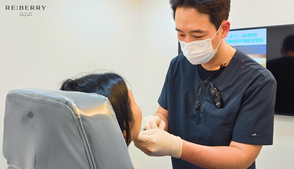 Board-certified dermatologist at Reberry Clinic performing a Botox injection on a patient