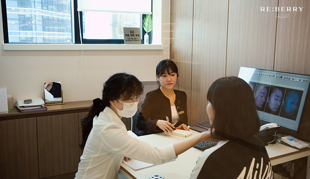 A doctor consulting a patient for botox treatment at Reberry Clinic in Korea