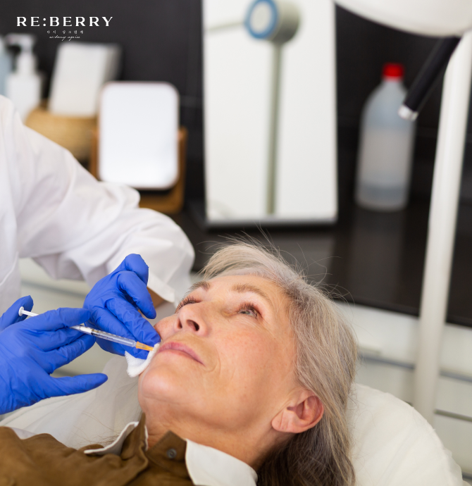 a women in her 60s getting botox injection at lips