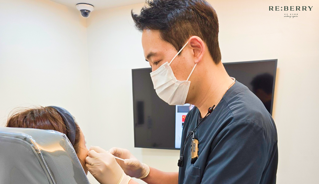 a board certified dermatologist injecting botox to patient at reberry clinic